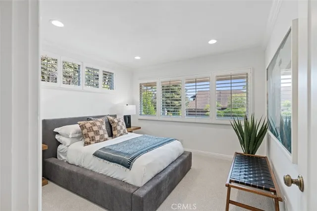 a bedroom with a bed and closet