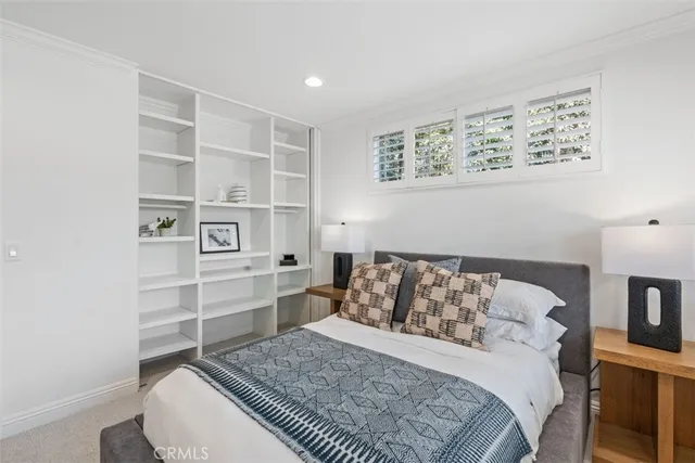 a bath room with a sink a toilet and a bathtub