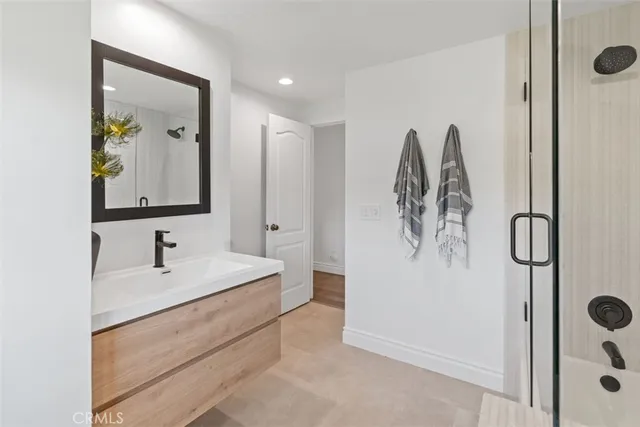 a bathroom with shower and bathtub