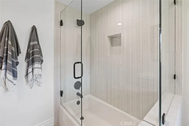 a view of a house with backyard porch and sitting area