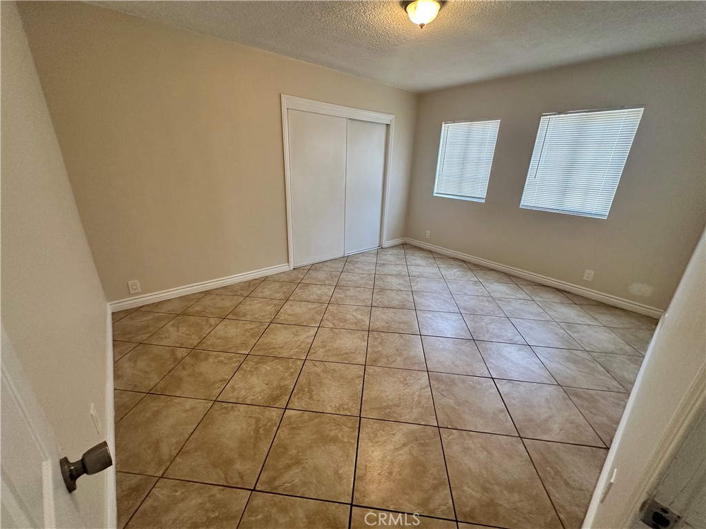 10516 Clovis Avenue Los Angeles, CA 90002 - Photo 5 of 13 a view of empty room