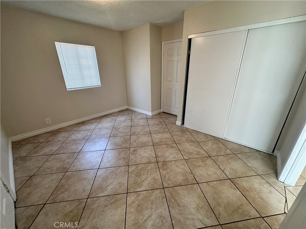 10516 Clovis Avenue Los Angeles, CA 90002 - Photo 9 of 13 a view of front door