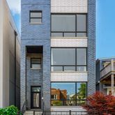 a front view of a house with a porch