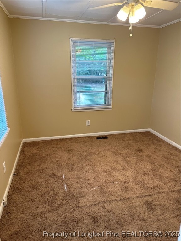 200 Post Avenue, Unit 2 Fayetteville, NC 28301 - Photo 8 of 8 a view of an empty room with window and chandelier fan