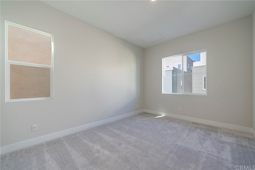 219 Chorus Irvine, CA 92618 - Photo 12 of 24 an empty room with windows