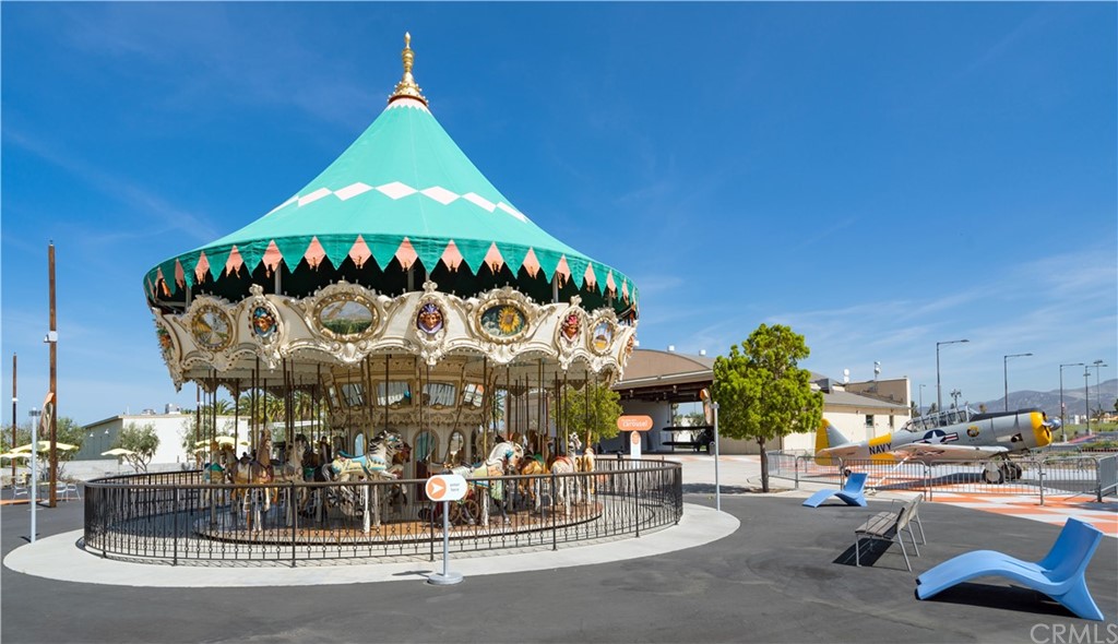 219 Chorus Irvine, CA 92618 - Photo 16 of 24 a living room with furniture and a fireplace