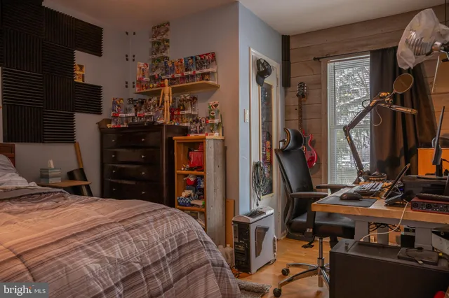 a view of entryway with wooden floor