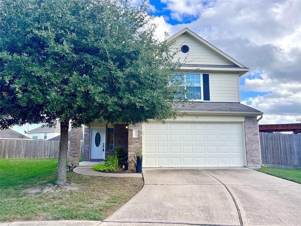 19111 Canaras Court Katy, TX 77449 - Photo 2 of 19 a front view of a house with a yard and garage