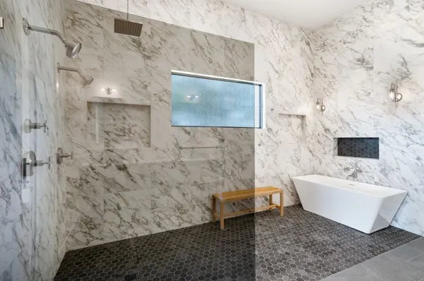 a bathroom with a toilet and a sink