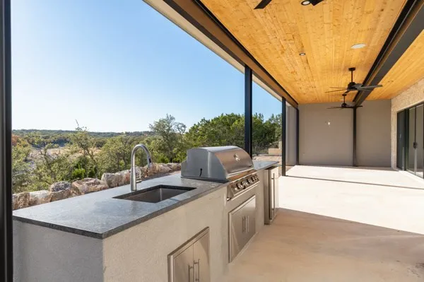 a view of balcony with furniture