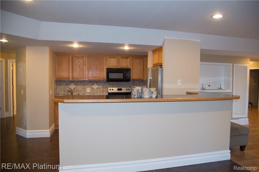 11661 Roberts Road Stockbridge, MI 49285 - Photo 29 of 53 Fully Finished Basement, 2Bedrooms, Full Kitchen, Full Bathroom, Laundry Hook up, Living Rm, Dining Rm,