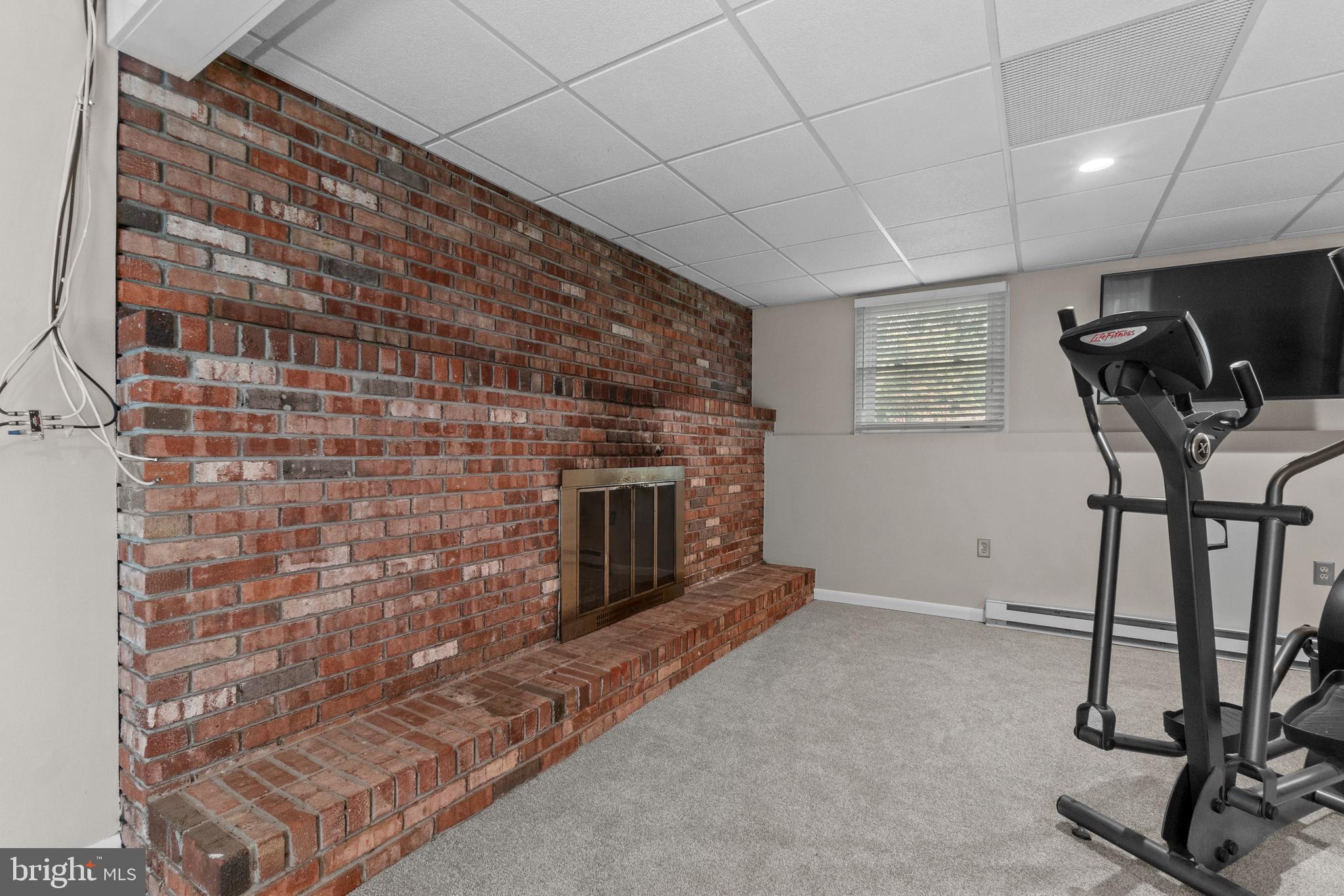 1706 Abelia Road Fallston, MD 21047 - Photo 28 of 41 a view of a livingroom with furniture and a fireplace
