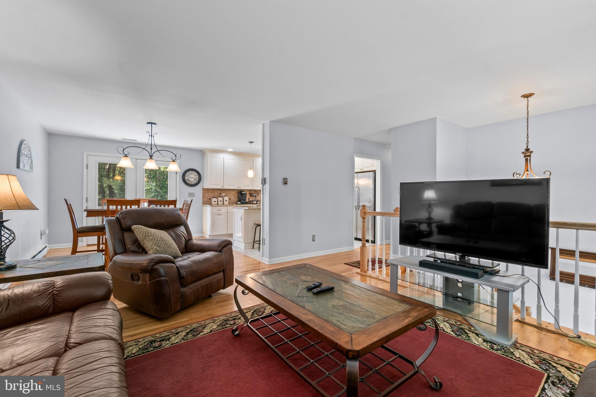 1706 Abelia Road Fallston, MD 21047 - Photo 9 of 41 a living room with furniture and a flat screen tv
