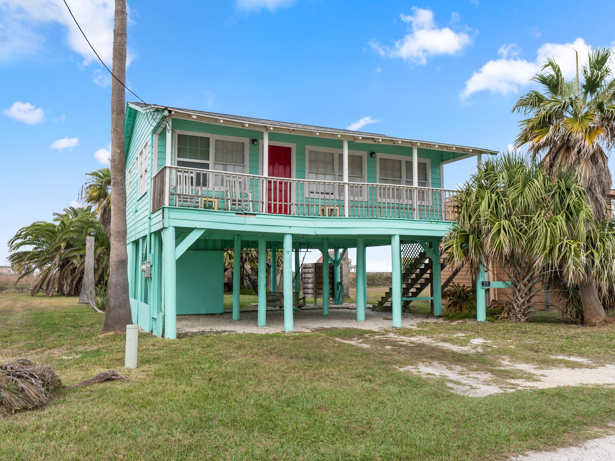 575 Beach Front Drive Matagorda, TX 77457 - Photo 3 of 39 a view of house with outdoor space and porch