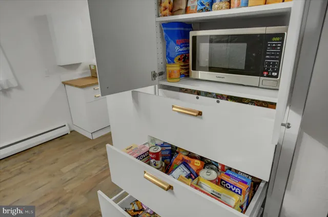 a kitchen that has a sink and a stove