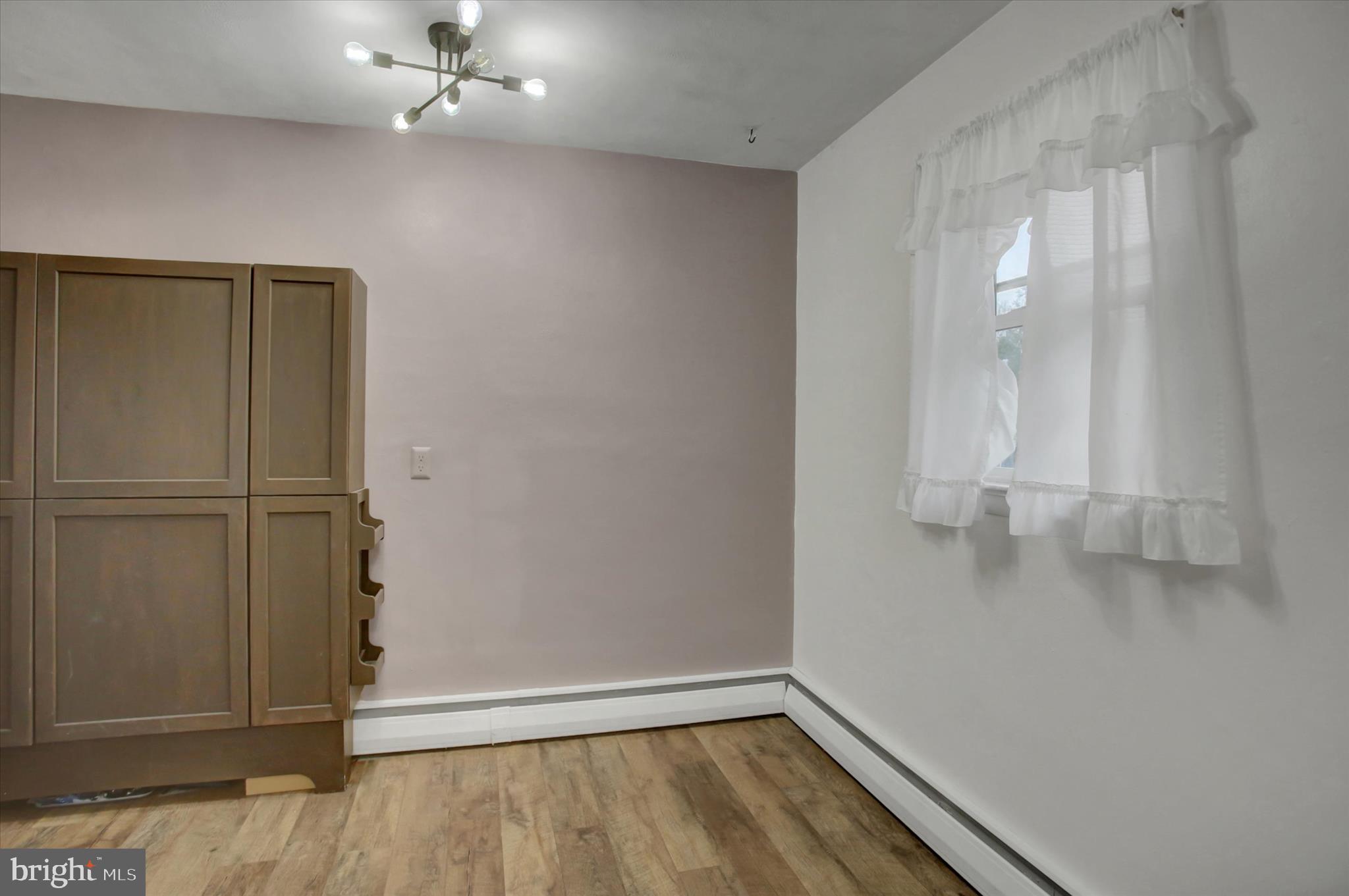 10894 Grindstone Hill Road Greencastle, PA 17225 - Photo 16 of 43 wooden floor in an empty room