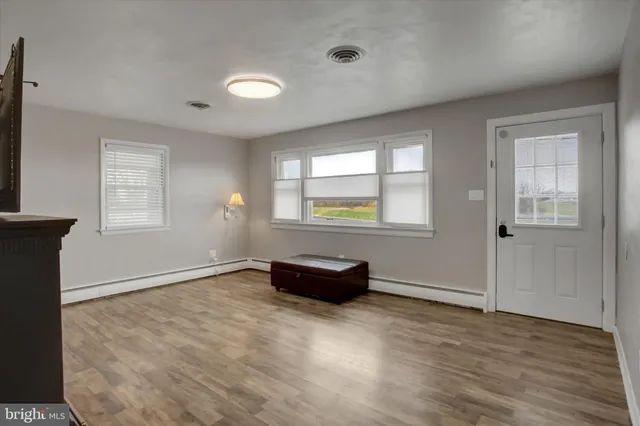 an empty room with windows