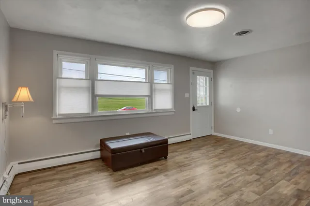 a bathroom with a sink and a large mirror