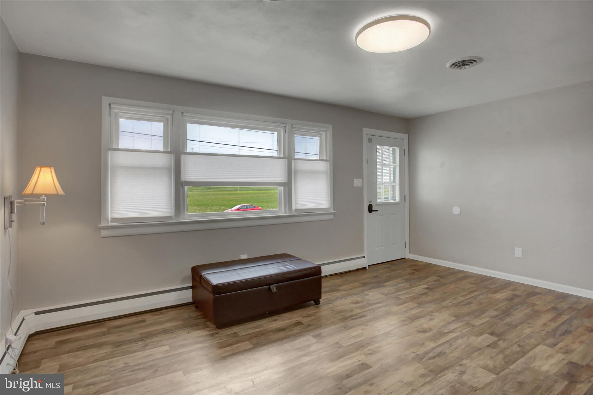 10894 Grindstone Hill Road Greencastle, PA 17225 - Photo 19 of 43 an empty room with windows