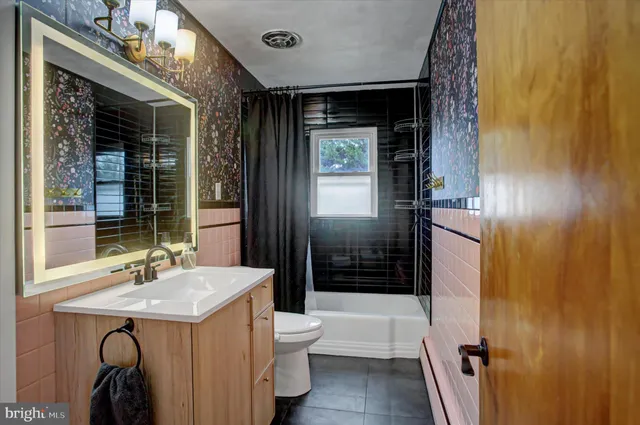 a bathroom with a sink and a shower