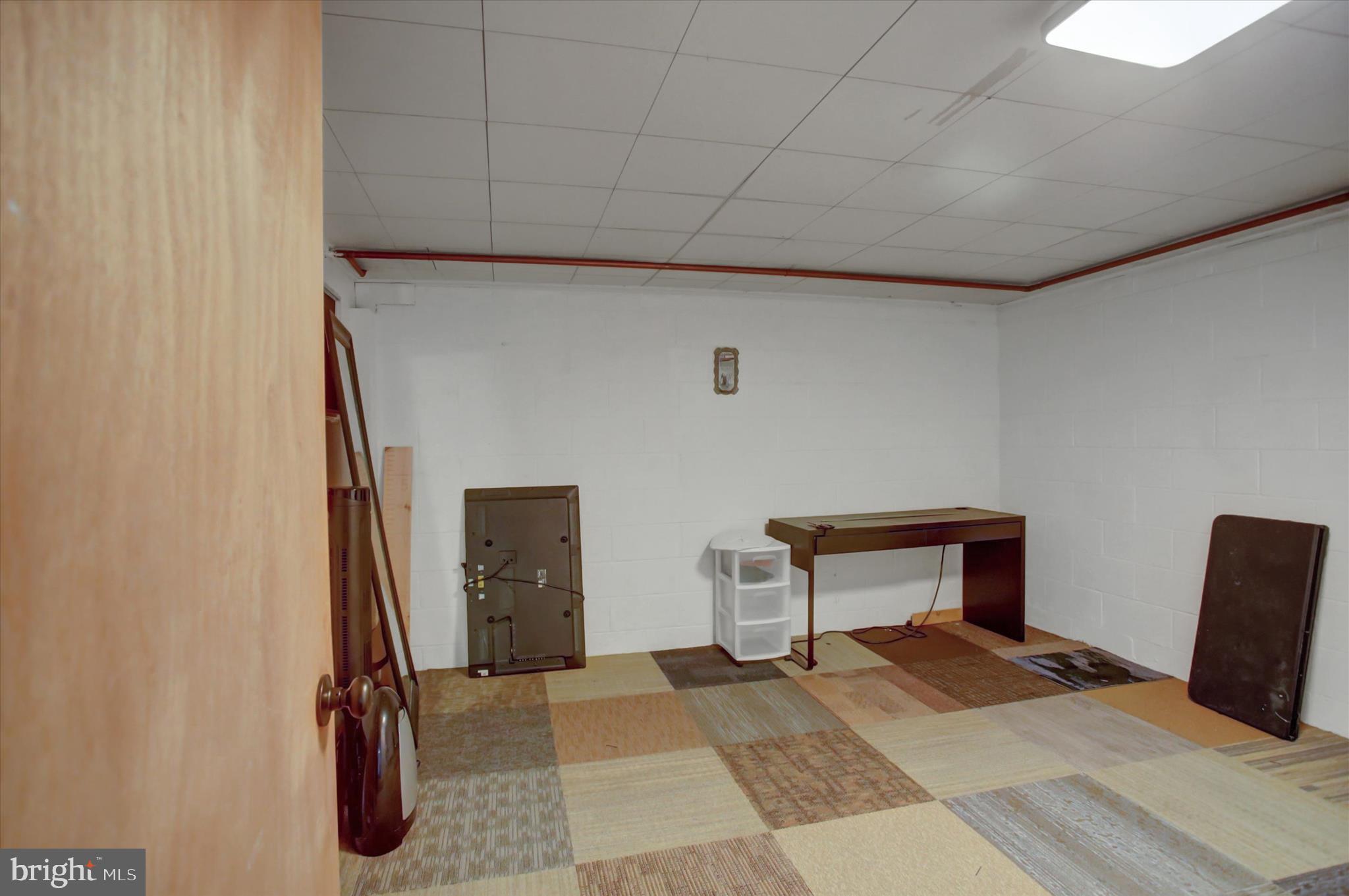 10894 Grindstone Hill Road Greencastle, PA 17225 - Photo 35 of 43 a bedroom with a bed and a chair