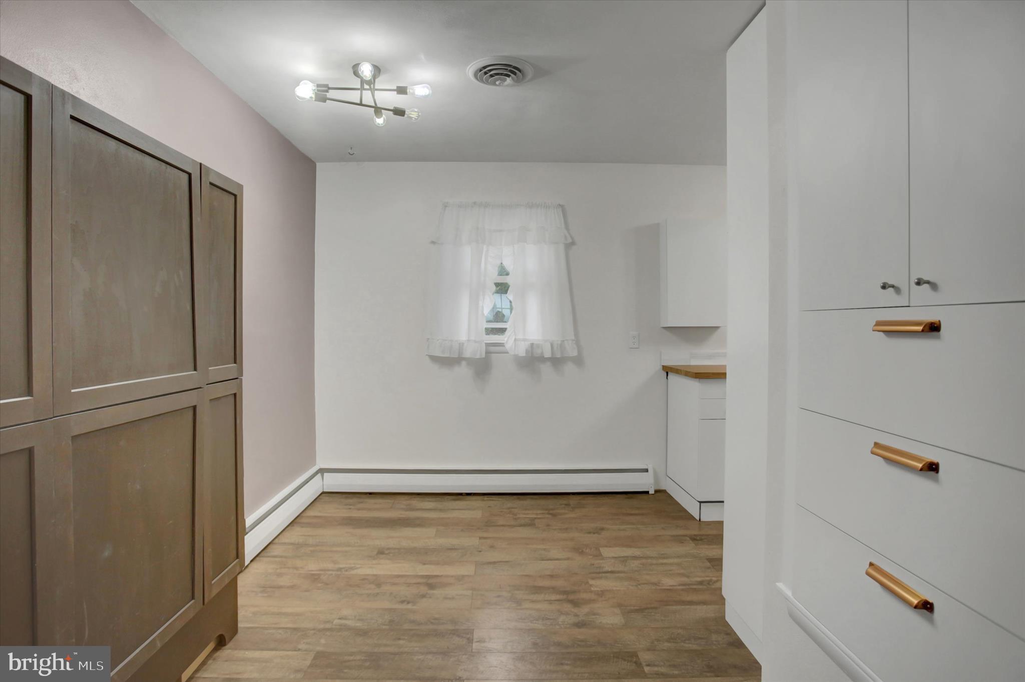 10894 Grindstone Hill Road Greencastle, PA 17225 - Photo 5 of 43 wooden floor in an empty room