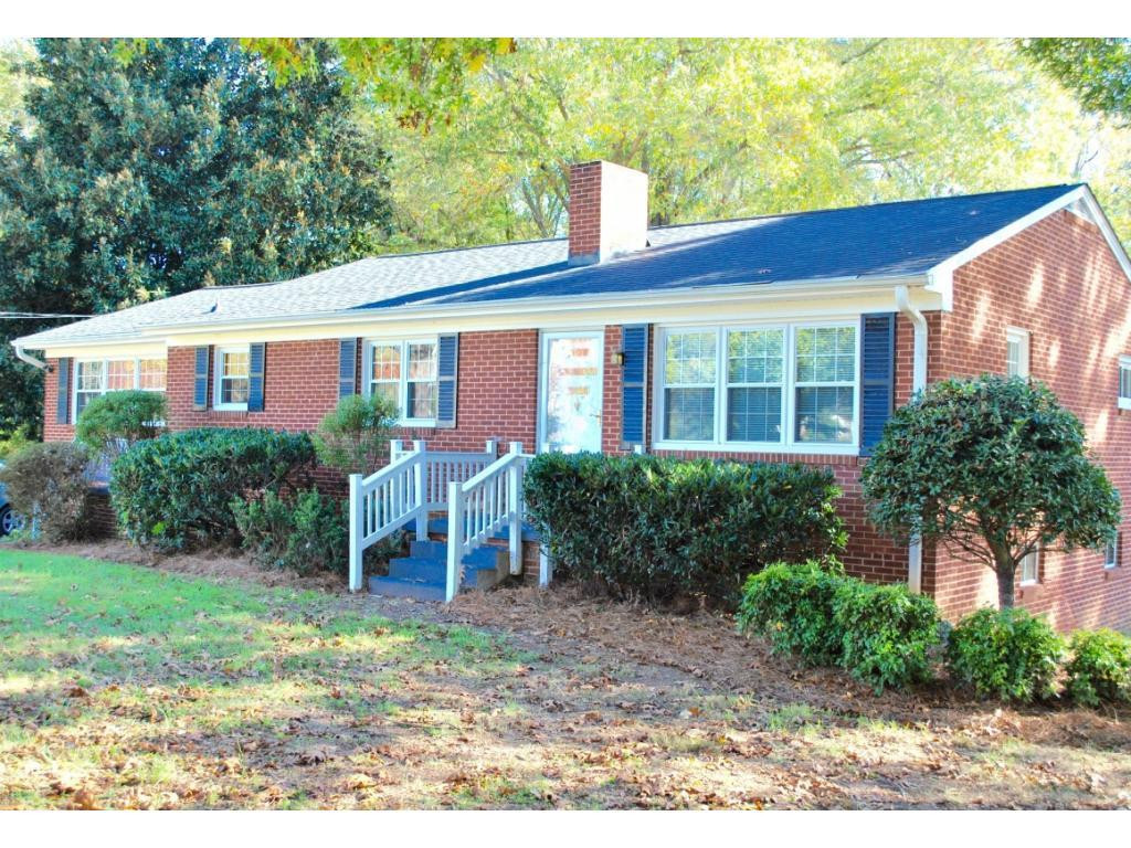 3212 Oak Ridge Road Summerfield, NC 27358 - Photo 1 of 22 a view of a house with backyard