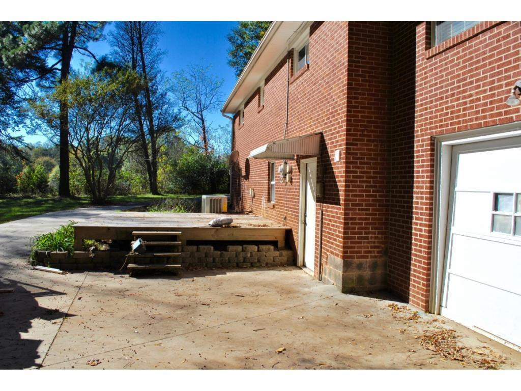 3212 Oak Ridge Road Summerfield, NC 27358 - Photo 19 of 22 a view of a yard with wooden fence
