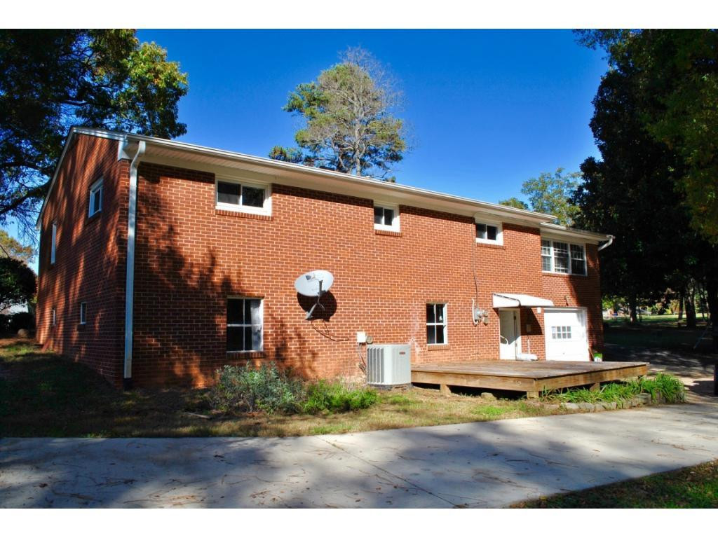 3212 Oak Ridge Road Summerfield, NC 27358 - Photo 20 of 22 a view of a house with a yard