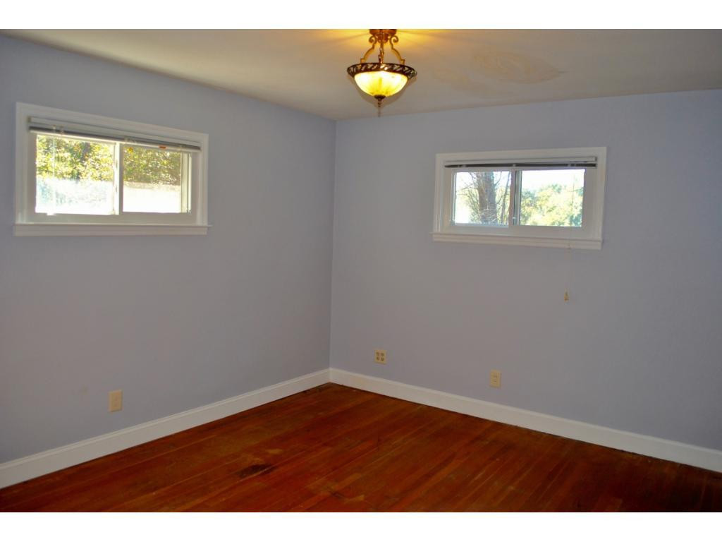 3212 Oak Ridge Road Summerfield, NC 27358 - Photo 10 of 22 an empty room with a window