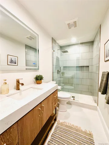 a bathroom with a sink a tub and a shower