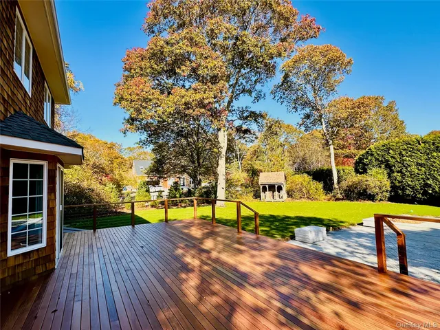 a view of a swimming pool with a seating space