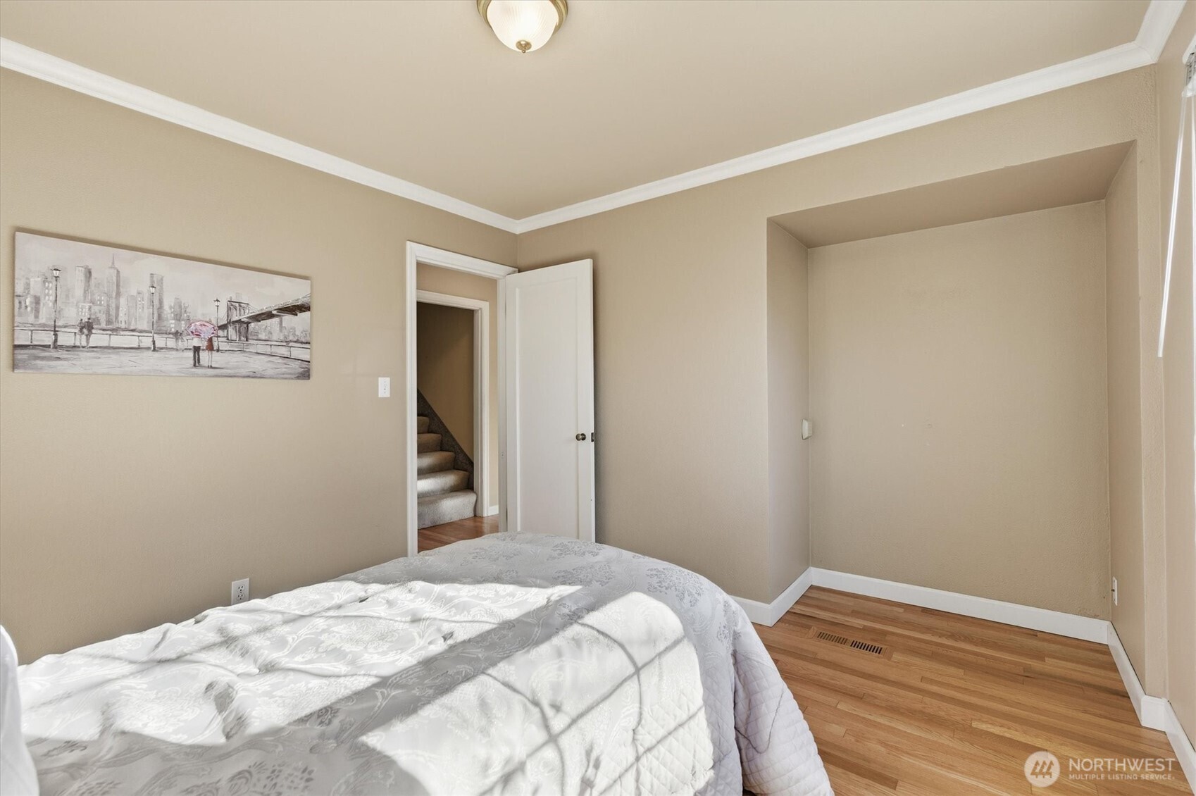 1403 18th Avenue Longview, WA 98632 - Photo 16 of 39 a bedroom with a bed and cabinets