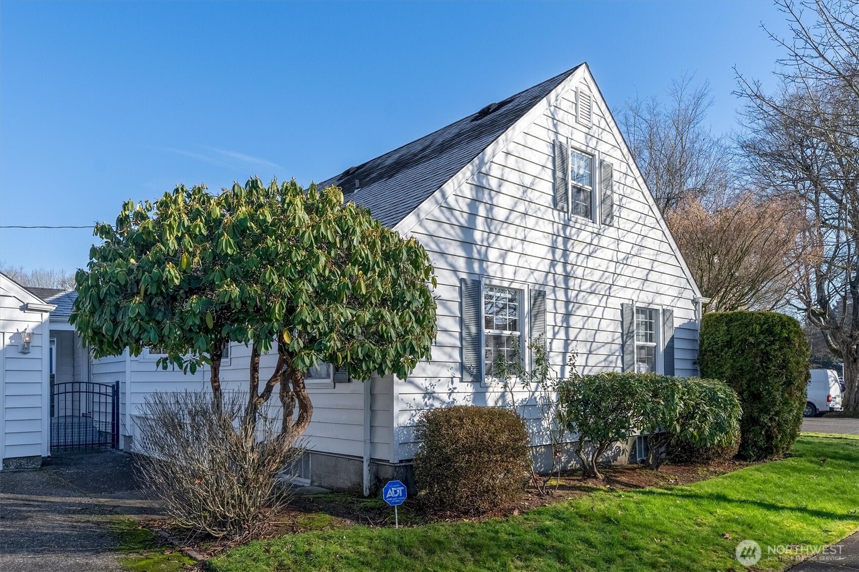 1403 18th Avenue Longview, WA 98632 - Photo 35 of 39 a view of a house with a yard and potted plants