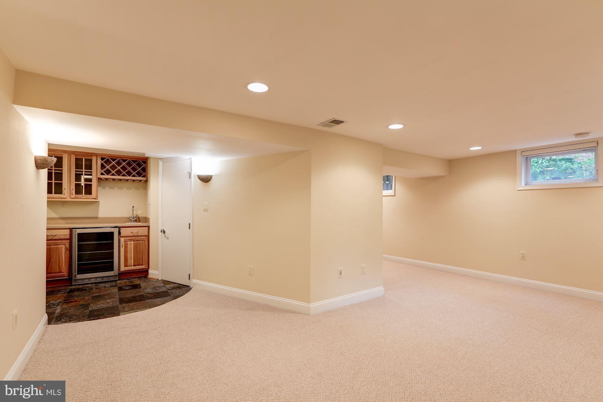 9700 Lorain Avenue Silver Spring, MD 20901 - Photo 22 of 30 Lower Level Family Room with Wet Bar