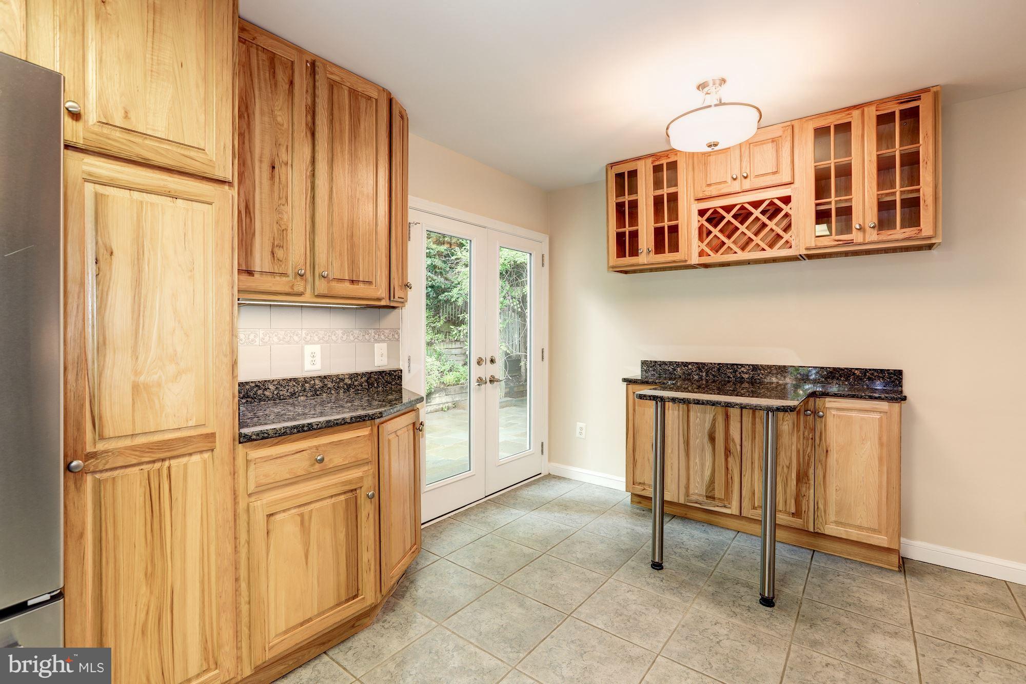 9700 Lorain Avenue Silver Spring, MD 20901 - Photo 5 of 30 Breakfast Bar #1 & Access to Patio