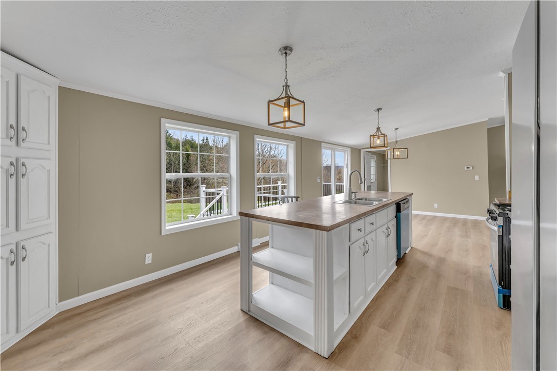 12082 State Highway Walton, NY 13856 - Photo 12 of 28 Island with rows of windows overlooking rear yard