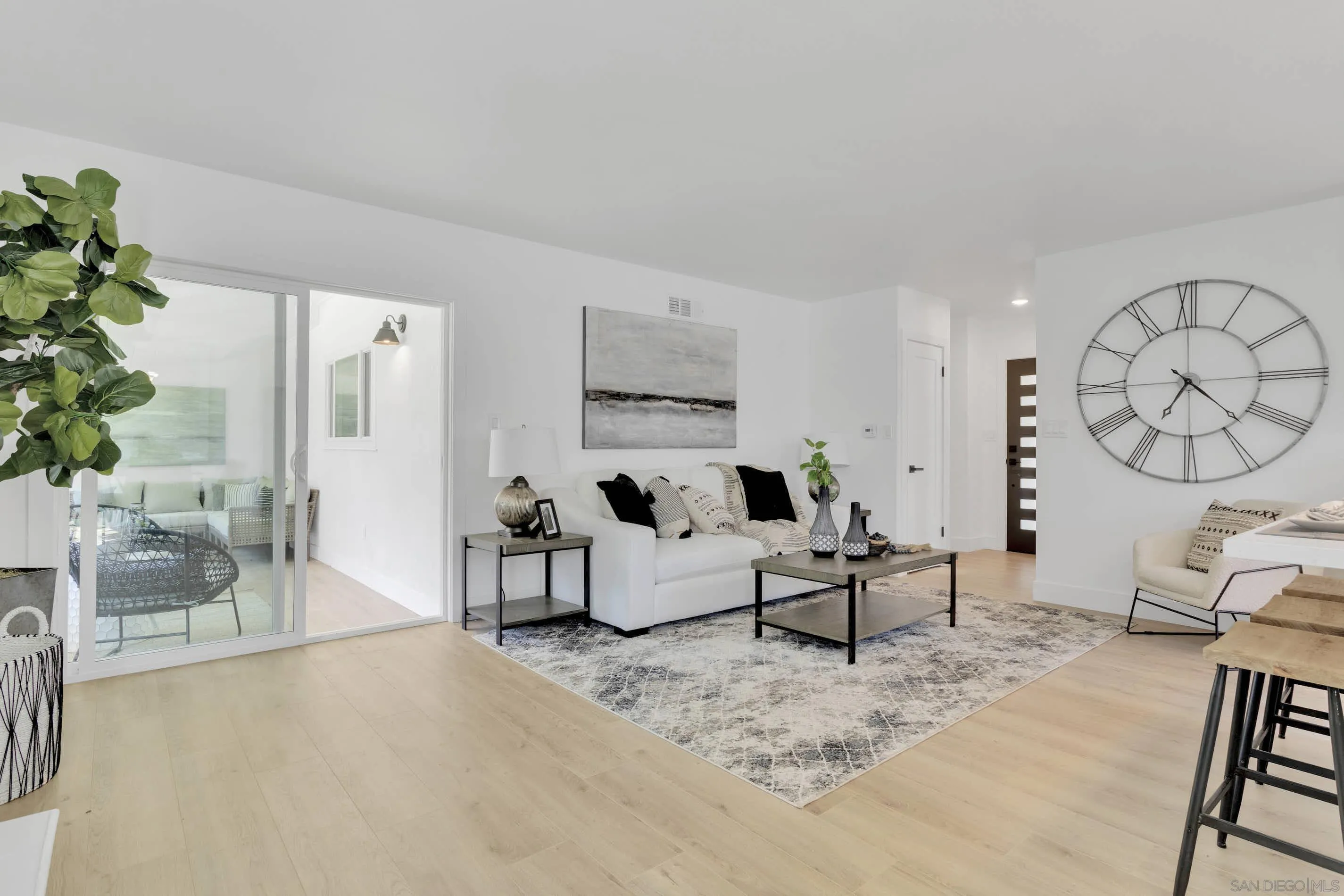 6630 Montclair Drive Riverside, CA 92504 - Photo 11 of 47 a living room with furniture and a large window