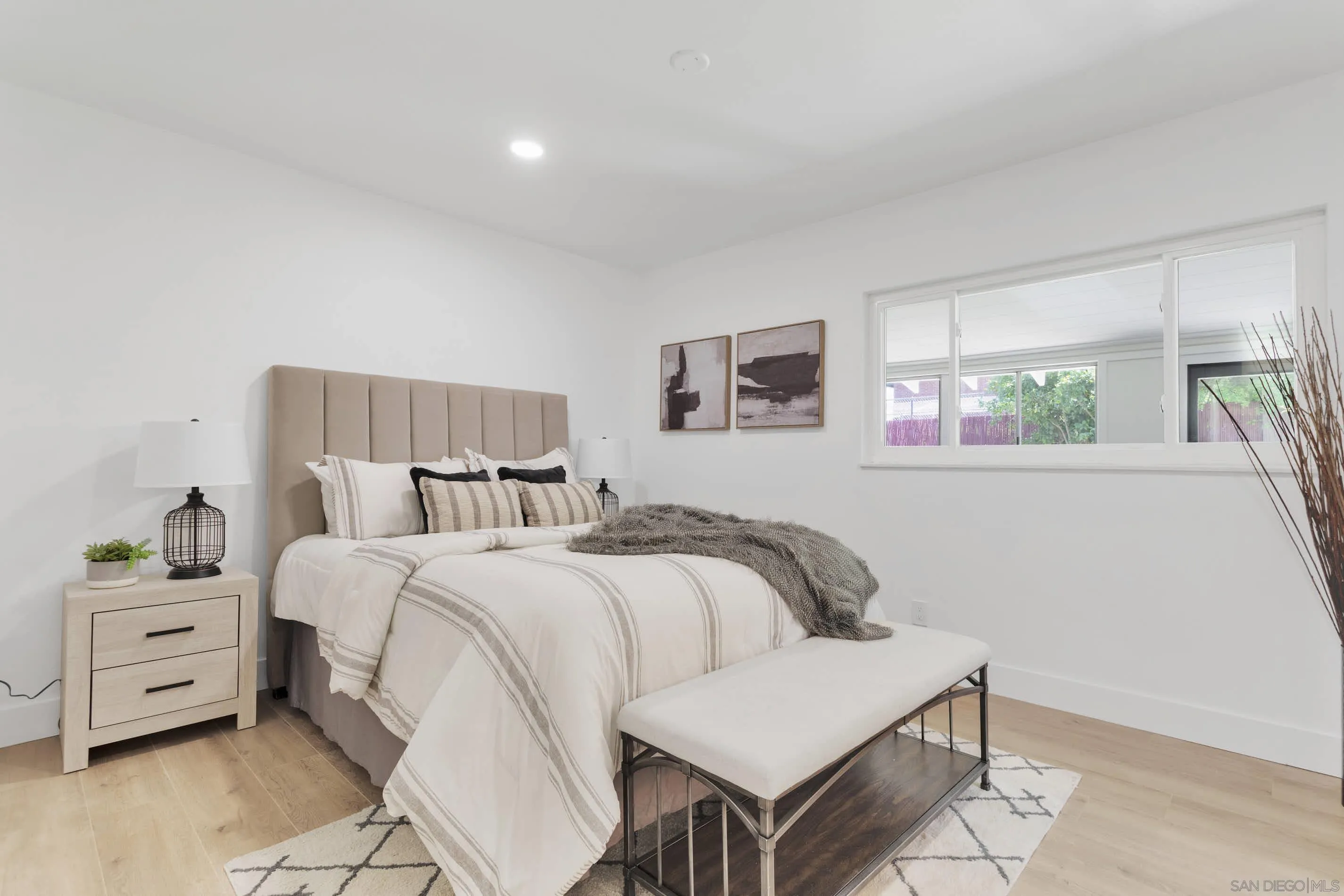 6630 Montclair Drive Riverside, CA 92504 - Photo 26 of 47 a bedroom with a bed and a dresser
