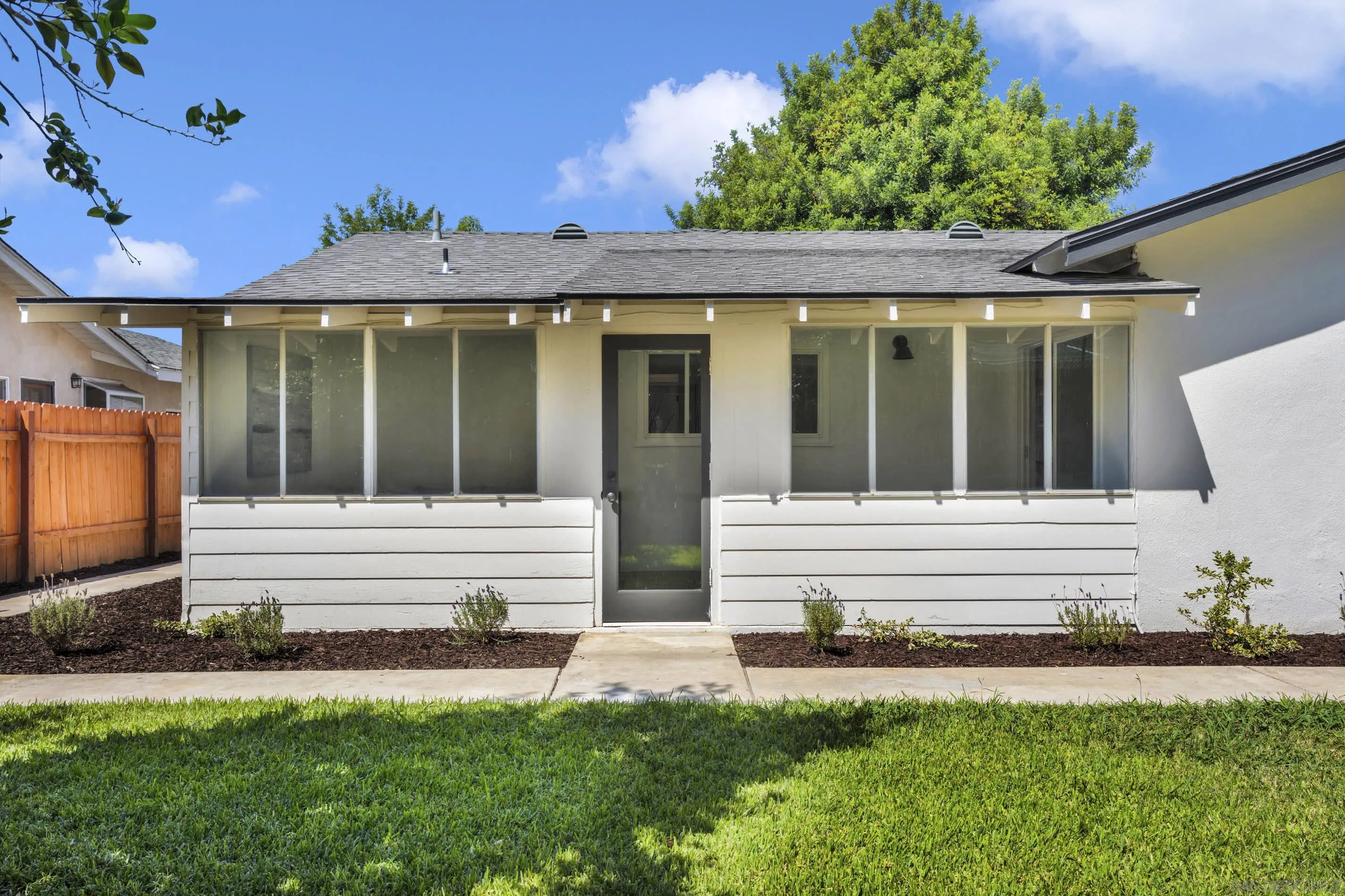 6630 Montclair Drive Riverside, CA 92504 - Photo 37 of 47 a front view of a house with a yard