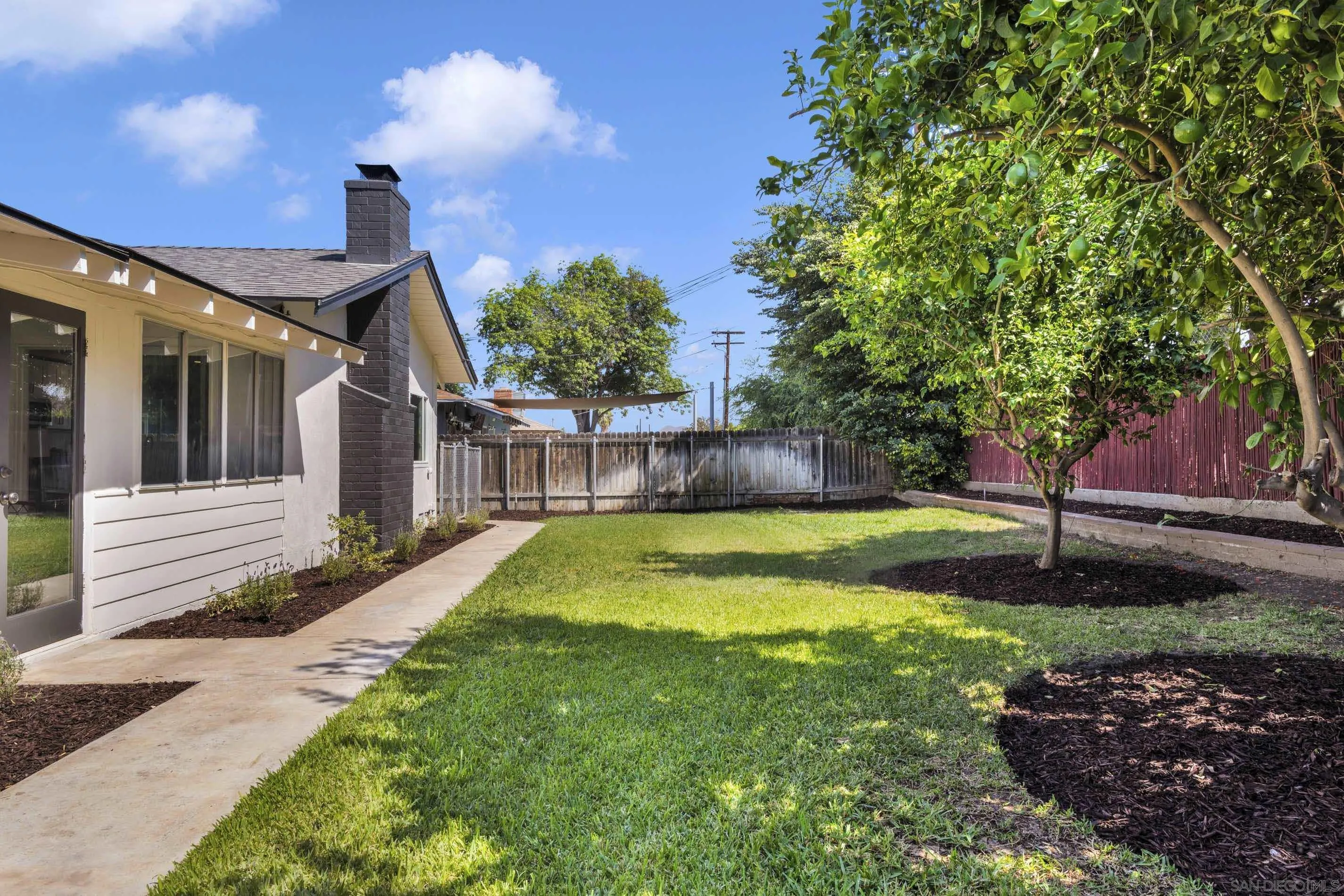 6630 Montclair Drive Riverside, CA 92504 - Photo 38 of 47 a swimming pool with some trees in the background