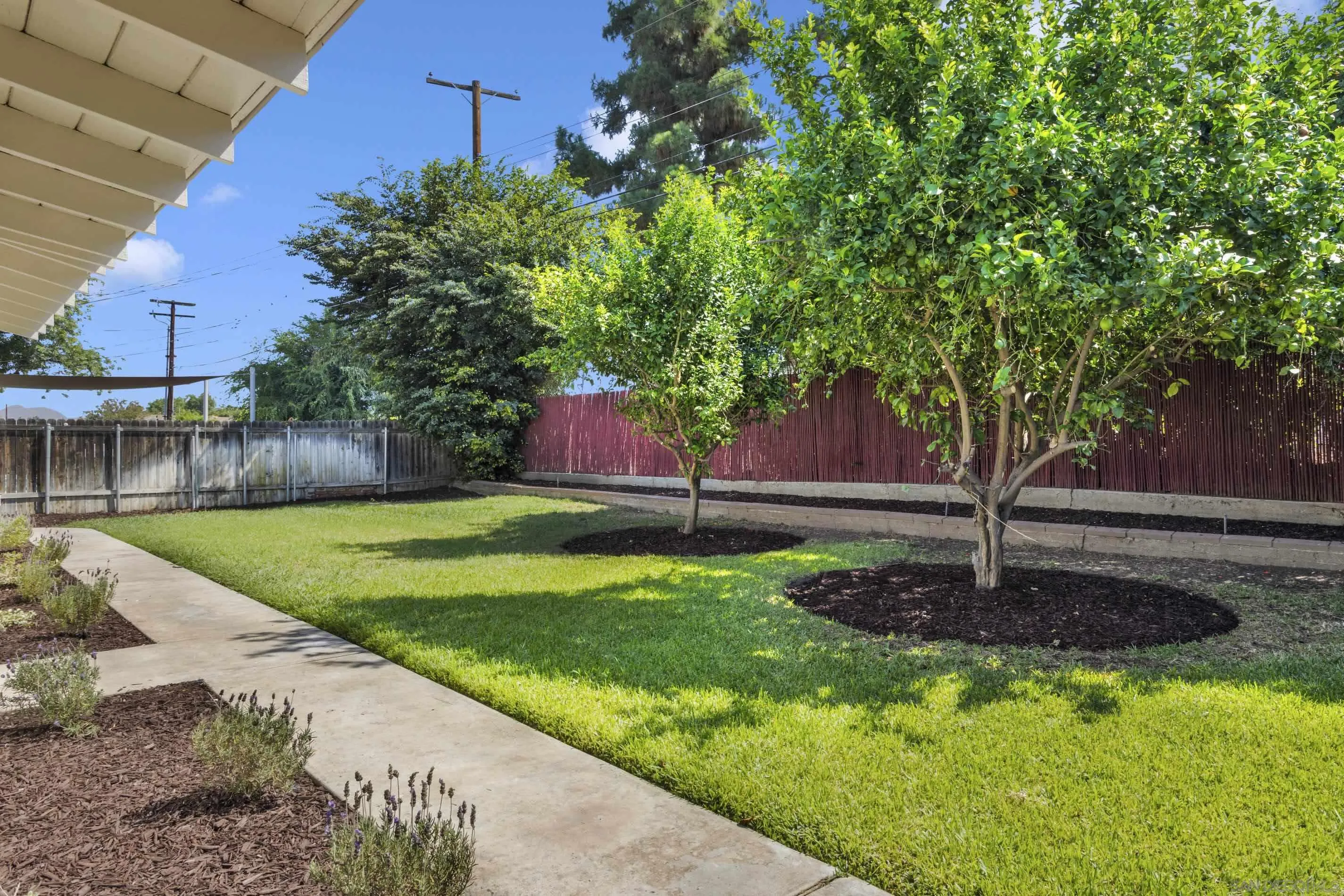 6630 Montclair Drive Riverside, CA 92504 - Photo 39 of 47 a backyard of a house with lots of green space