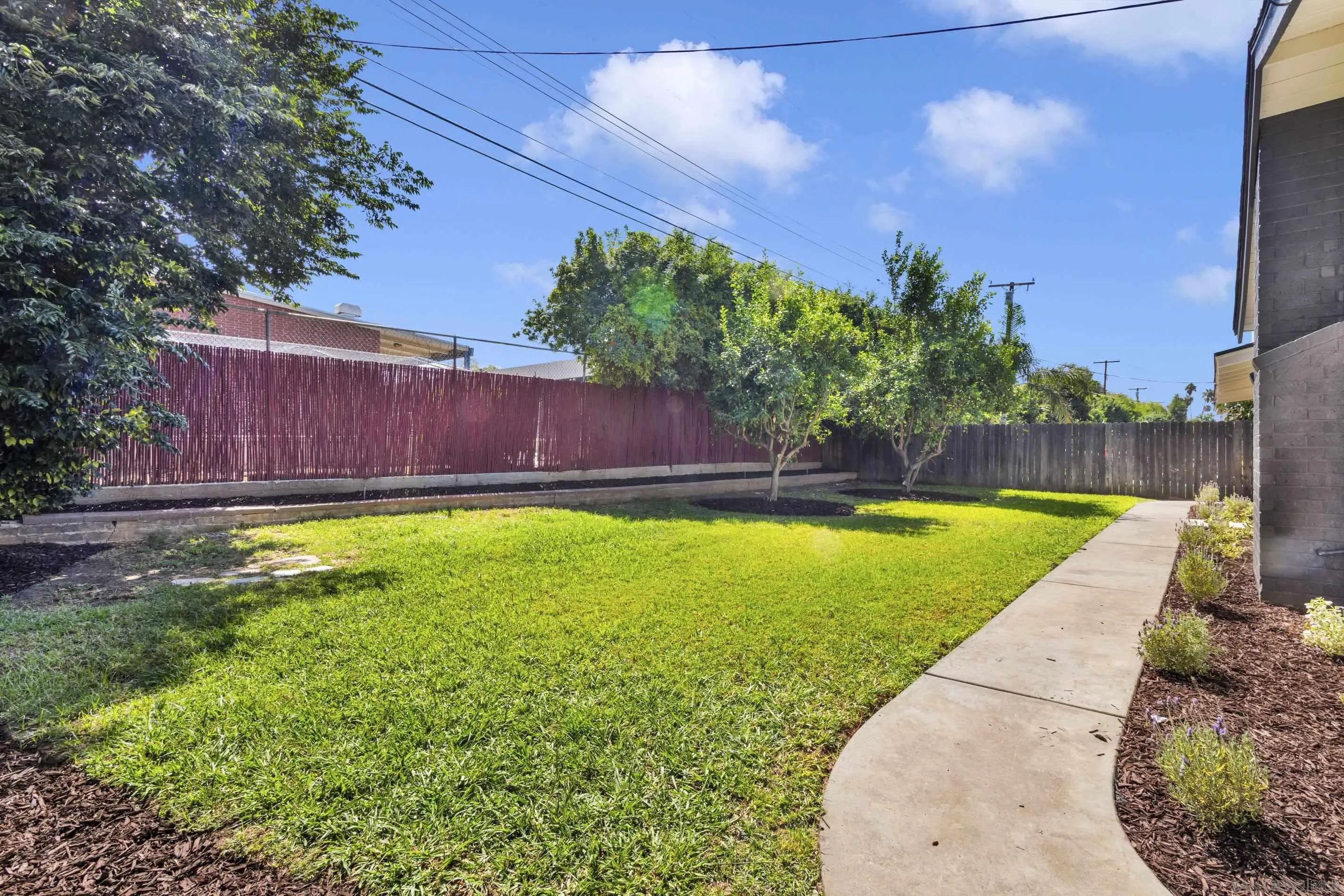 6630 Montclair Drive Riverside, CA 92504 - Photo 43 of 47 a view of a swimming pool with a yard