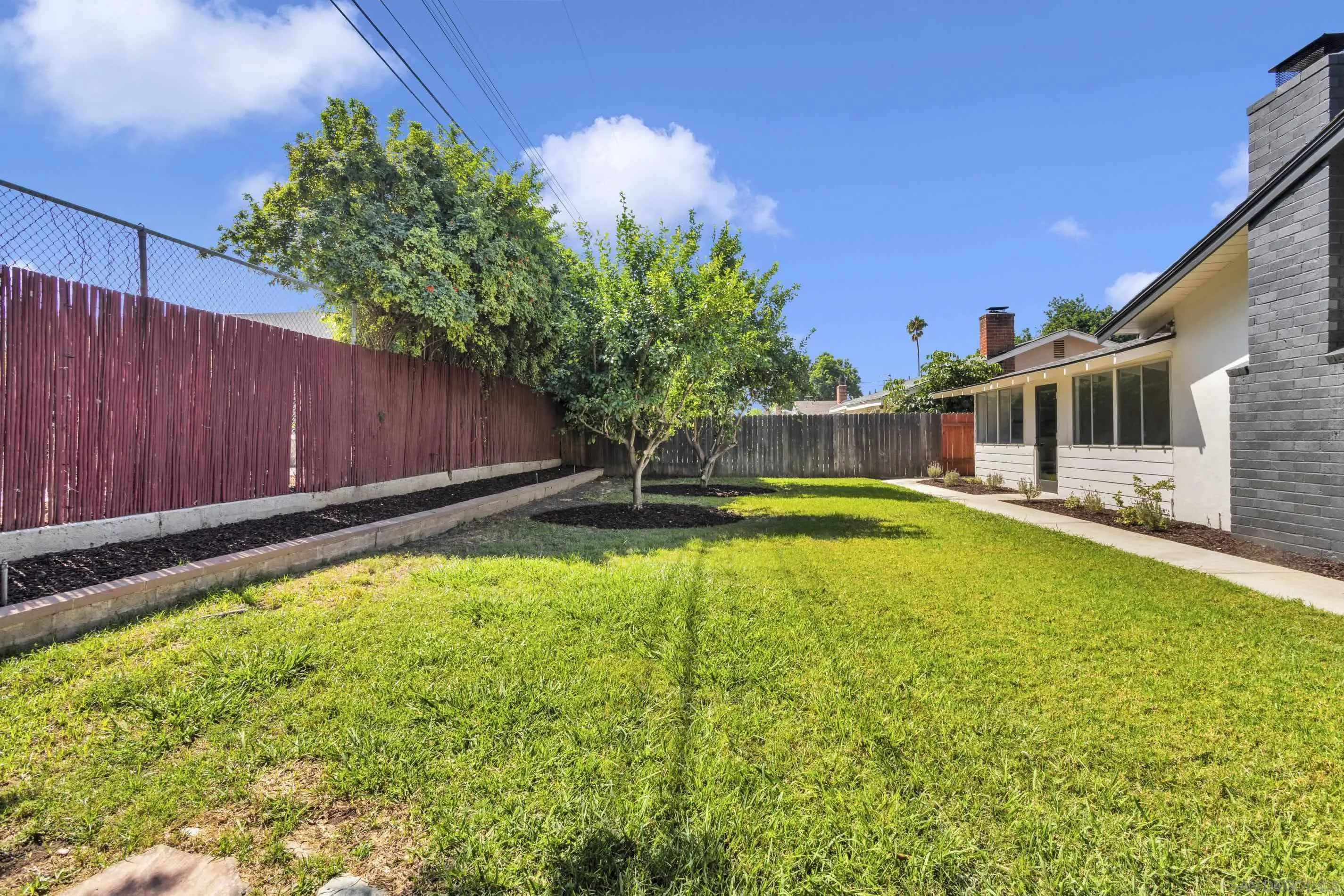 6630 Montclair Drive Riverside, CA 92504 - Photo 44 of 47 a swimming pool with yard outdoor seating and hardwood
