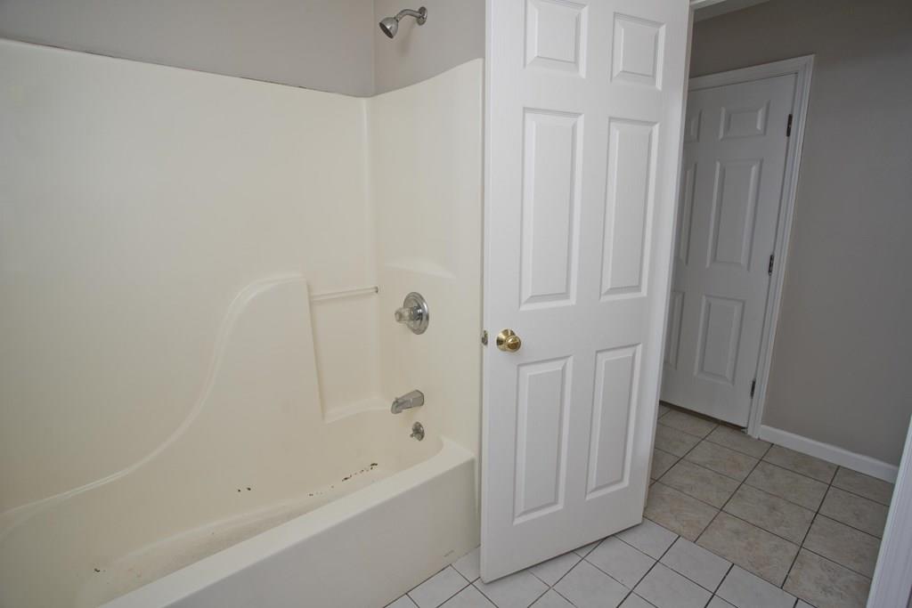 23 Martha Street Springfield, MA 01151 - Photo 13 of 19 a bathroom with a bathtub