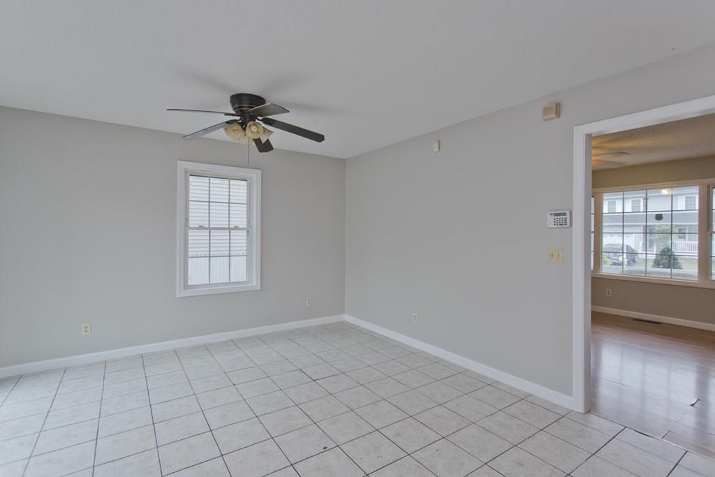 23 Martha Street Springfield, MA 01151 - Photo 8 of 19 a view of an empty room and window
