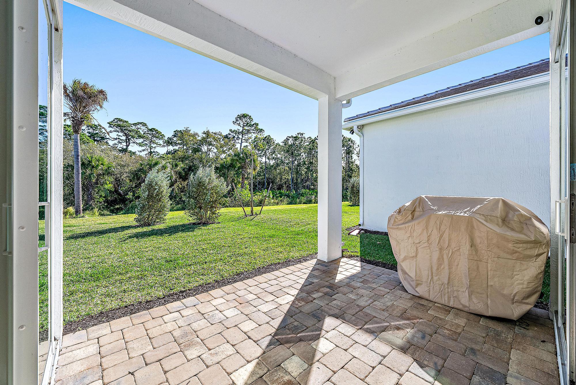 9775 Southwest Meridian Way Stuart, FL 34997 - Photo 11 of 33 Covered lanai