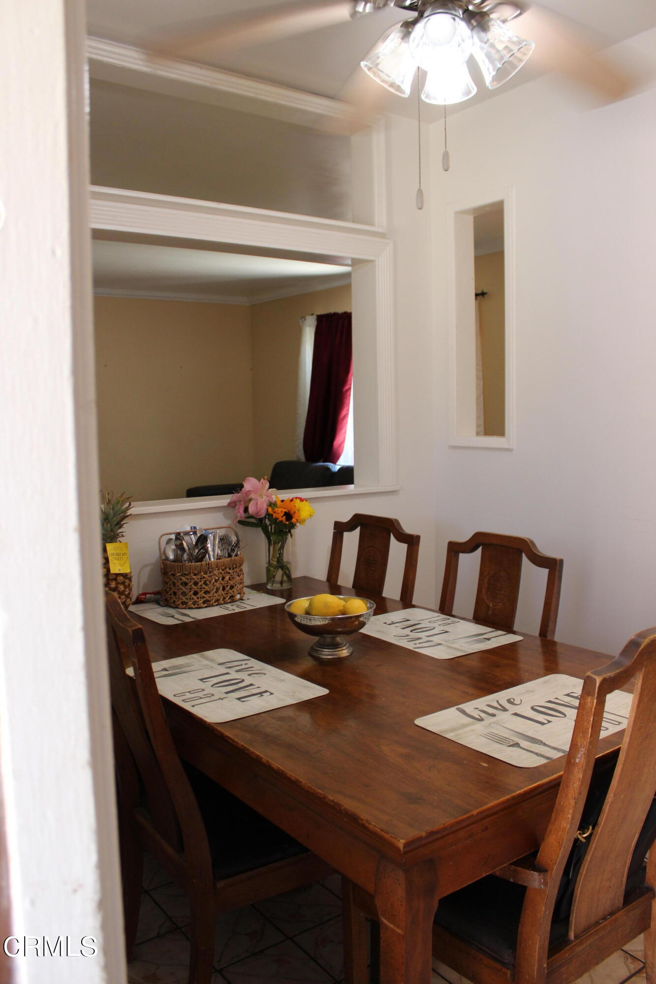 1111 South M Street Oxnard, CA 93033 - Photo 14 of 22 a view of a dining room with furniture