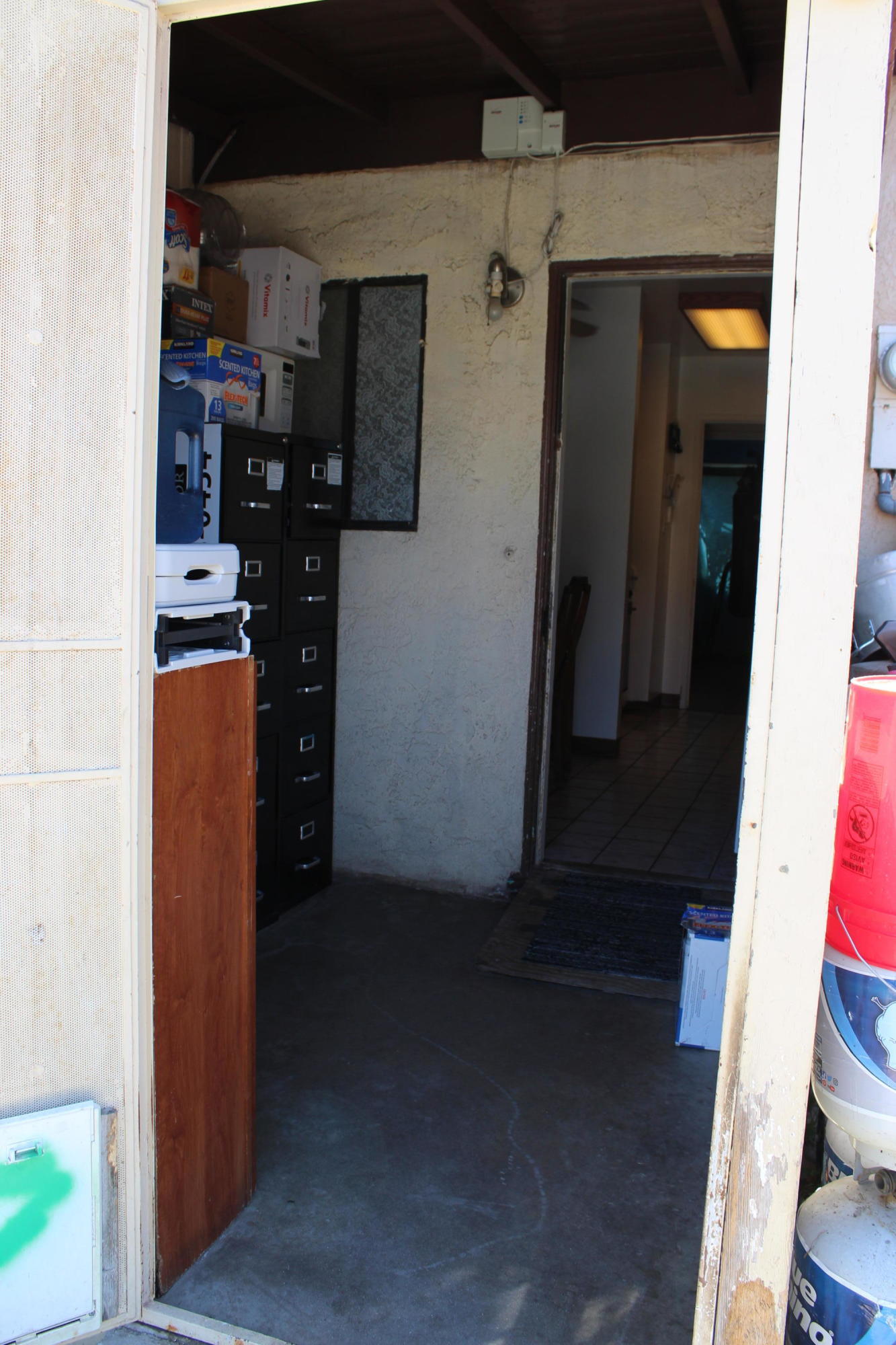 1111 South M Street Oxnard, CA 93033 - Photo 20 of 22 a view of a kitchen from the hallway