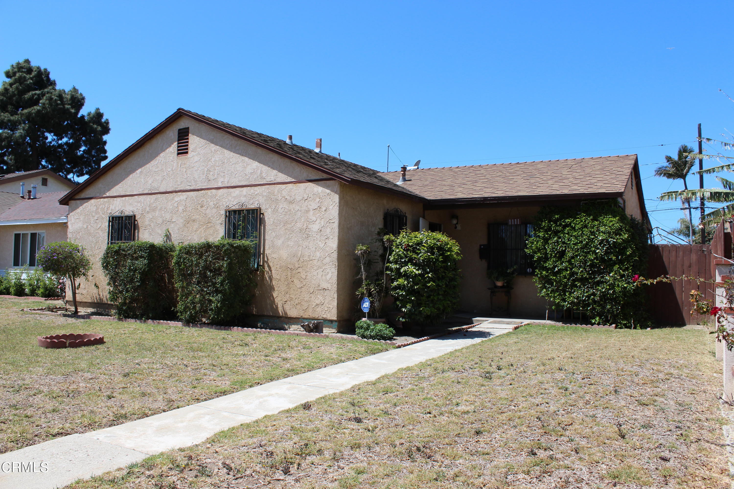 1111 South M Street Oxnard, CA 93033 - Photo 22 of 22 a view of a house with a yard